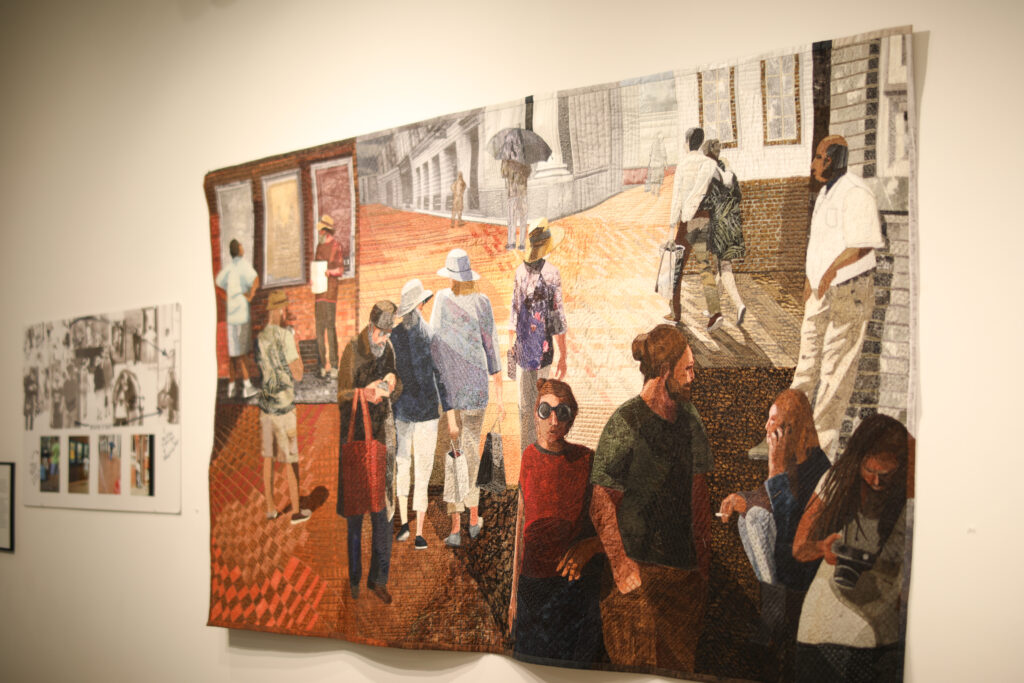 “Mall Activity” by Jill Kerttula, a Fiber Art piece showcasing a collage based on photos of people on the downtown mall.