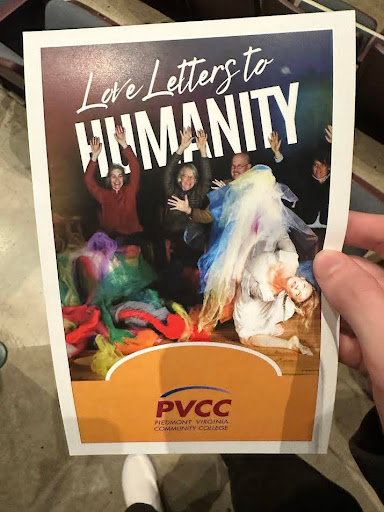 PVCC's "Love Letters to Humanity" flyer featuring a woman falling back on stage with various colored cloth and people behind her throwing their hands up.